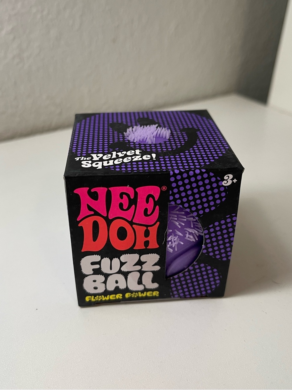 NeeDoh Flower Power Fuzz Ball Purple
